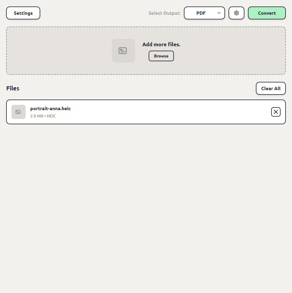 ConvertSave with a HEIC photo queued and PDF selected as the output format